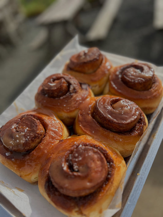 Saturday only. 6 x cinnamon buns with caramel.